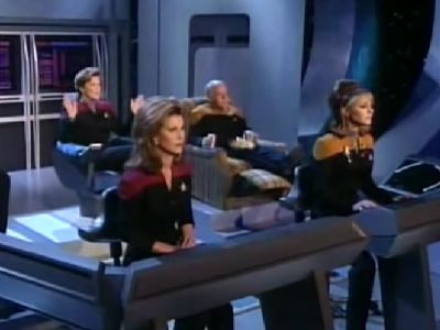 Four people are sitting separately as they are talking.